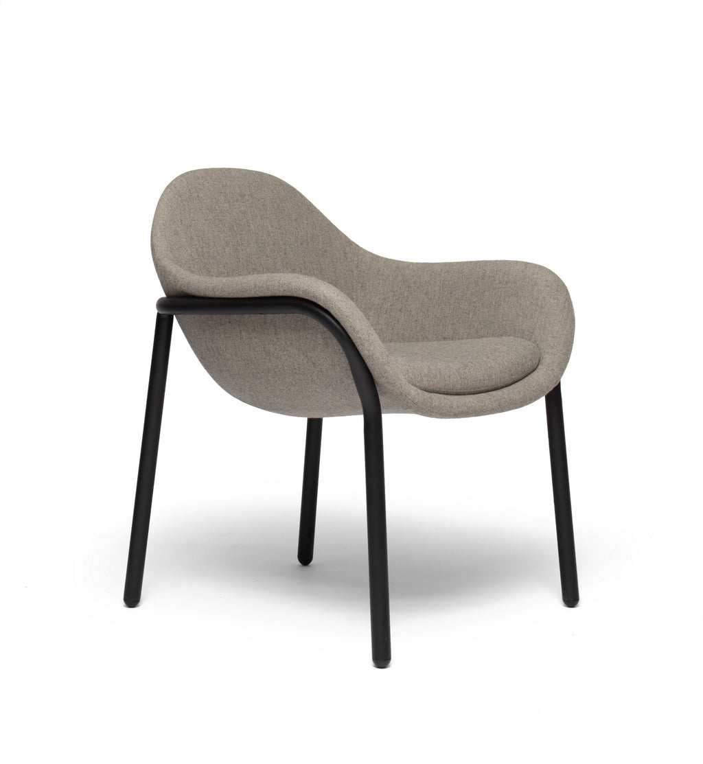 Bowler designer lounge chair by Matsu, designed by Joeri Reynaert, featuring a soft curved upholstered seat with premium Gabriel fabric