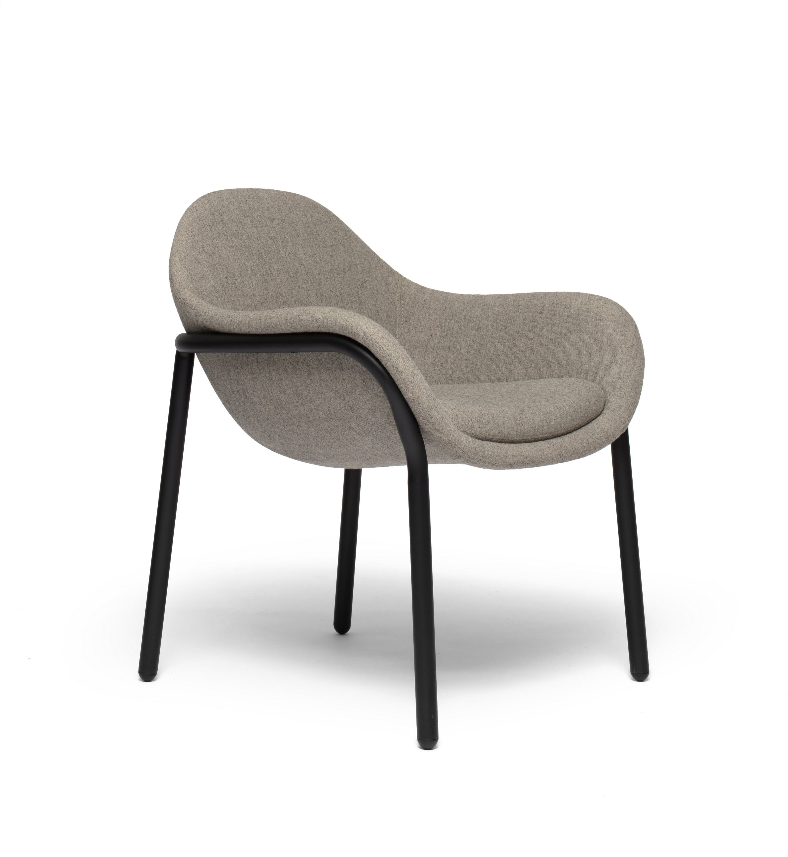 Bowler designer lounge chair by Matsu, designed by Joeri Reynaert, featuring a soft curved upholstered seat with premium Gabriel fabric