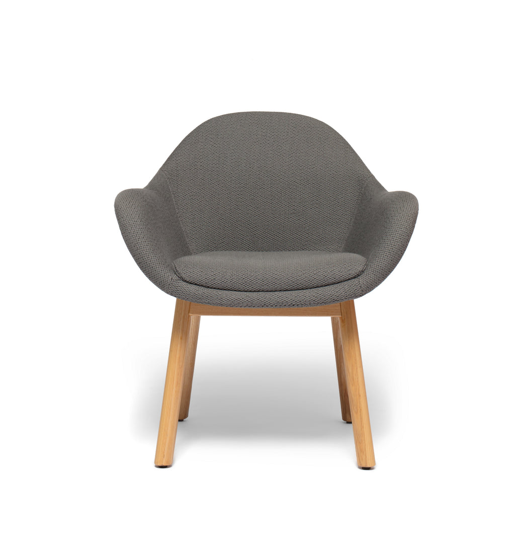 Bowler designer lounge chair by Matsu, designed by Joeri Reynaert, featuring a soft curved upholstered seat with premium Gabriel fabric